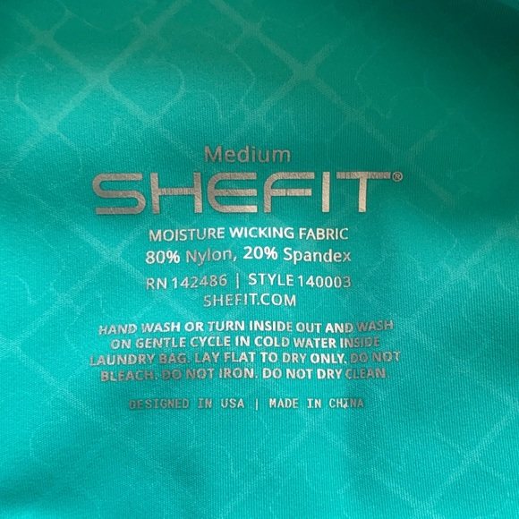 SHEFIT Fierce Boss Turquoise Teal High Rise Moisture
Wicking Leggings - Picture 6 of 7